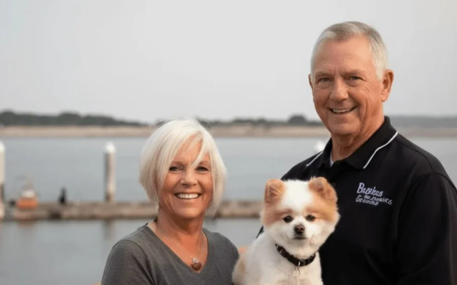 Barry Winters and Jodie VanLeuven on the Bandon harbor dock with their dog