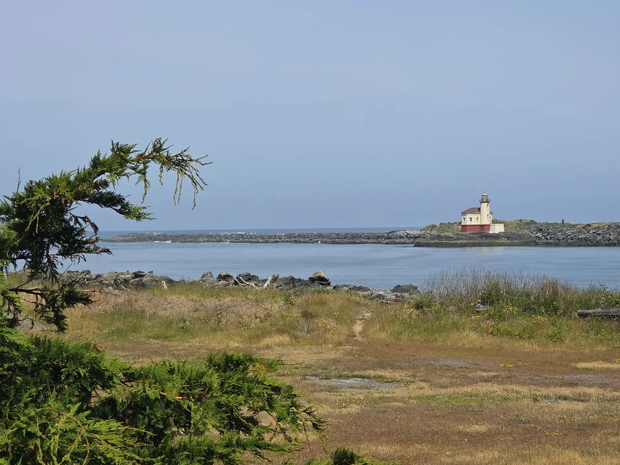 The Coquille River Lighthouse at the mouth of the Coquille River near Bandon, Oregon